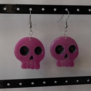 Pink skull earrings